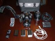 Olympus E-510 with 2 lenses and 3 batteries